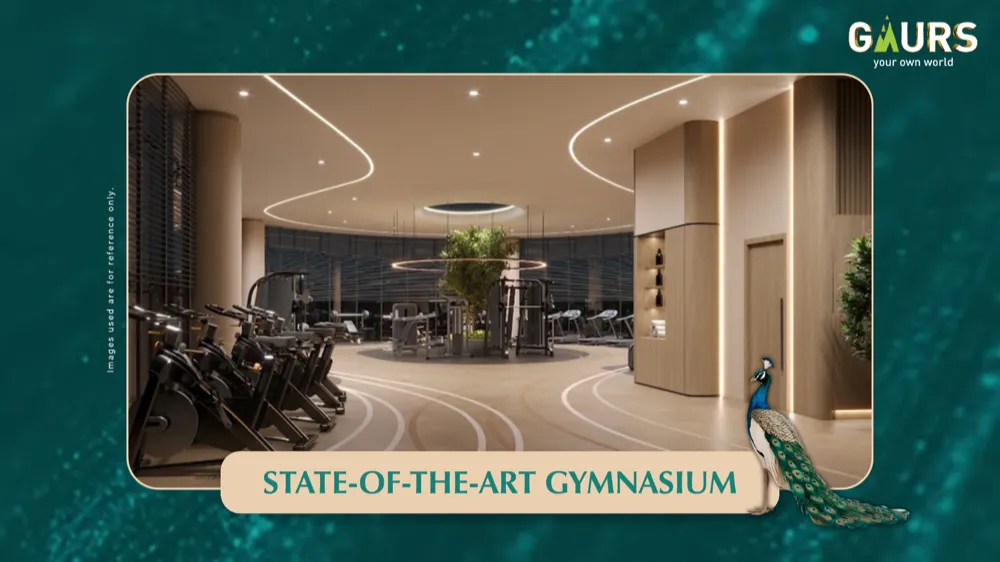 State-of-the-art gymnasium at Gaur Alaris clubhouse with training equipment and glazed wall